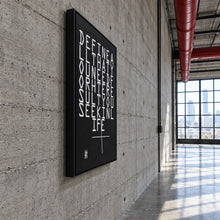 Define All That You Need by Yagil Weiler | Studio Edition float framed canvas | side view on a concrete loft wall