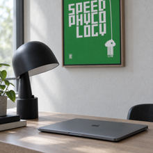 F1 Speed And Ice Creme by Yagil Weiler | Studio Edition float framed canvas | still life with a desk lamp and laptop