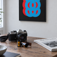 Motion Over Phycology by Yagil Weiler | Studio Edition float framed canvas | still life with a camera and film rolls