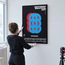 Motion Over Phycology by Yagil Weiler | Studio Edition 100 × 150 cm | being hung by an art handler with a laser level