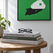 Shaved Creme by Yagil Weiler | Studio Edition float framed canvas | still life with art books and reading glasses