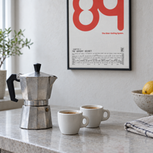 STAR EATIN' SPOON by Yagil Weiler | Studio Edition float framed canvas | still life with a moka pot and espresso cups